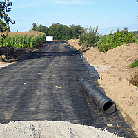 Basetrac Grid entlang einer Straßenbaustelle zur Tragschichtbewehrung