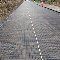 Installed SamiGrid on the existing pavement, prior to construction of asphalt overlay (50 mm AC14)