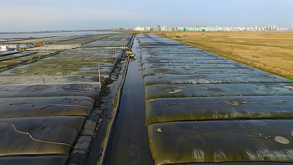 Anpassbare Schlammbefüllung mit SoilTain Entwässerungsschläuchen Flexible Befüllmenge mit SoilTain Entwässerungsschläuchen