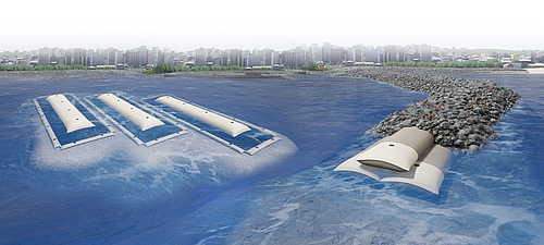 Buhnen und Wellenbrecher realisiert mit SoilTain Tubes für effektiven Küstenschutz SoilTain Tubes mit Kolkschutzmatte als zentrales Bauwerk und SoilTain Tubes für Küstenschutz, abgedeckt durch Wasserbausteine